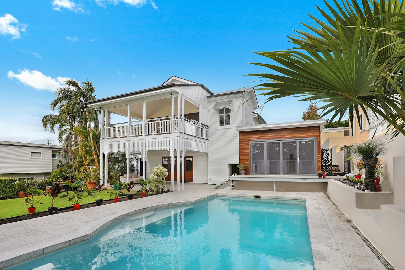 Landscaped pool surround and gardens at a Queensland home